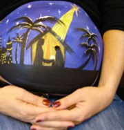 Роспись по животу – новогоднее украшение для беременных