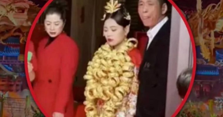 В Китае невесте повесили на шею 100 золотых браслетов